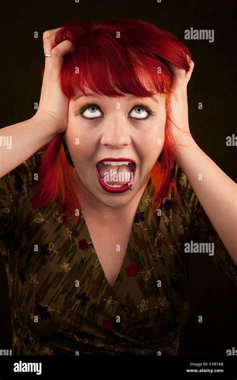 Pretty Punky Girl With Brightly Dyed Red Hair Stock Photo Alamy