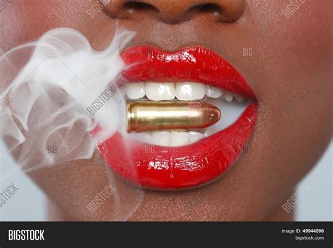 Close Woman Red Lips Biting Bullet Image And Photo Bigstock