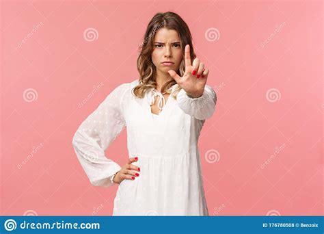 Stop Enough Portrait Of Serious Looking Assertive And Strong Blond Girl In White Dress Extend