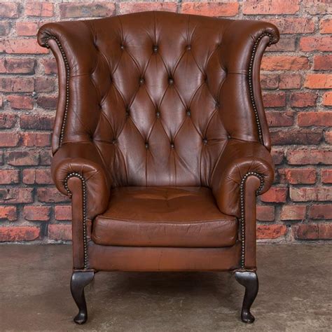 Shop for leather chairs at crate and barrel. Early 20th Century Danish Brown Leather Wing Back Chair ...