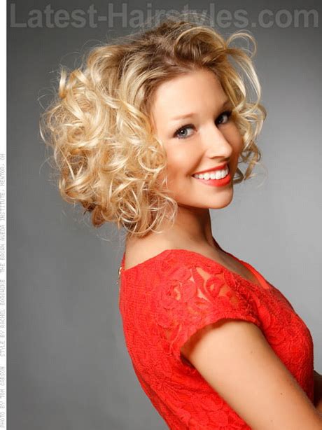 It's all about enhancing the curl, instead of weighing it down. Short curly hairstyles for oval faces
