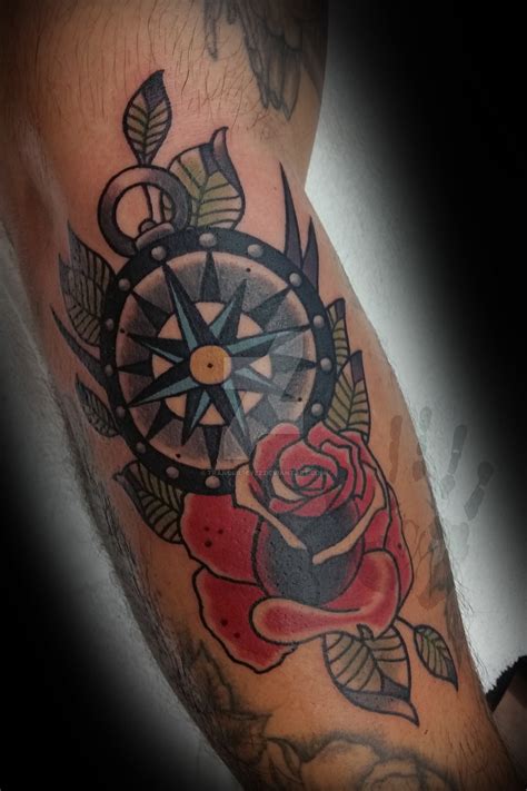 This rose compass tattoo has a nice feminine touch to it and looks amazing once it appears on your body. Compass Rose Traditional (Old School) Tattoo by tranquil ...