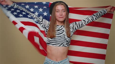 Lovely Young Woman Waving And Wrapping In American Usa Flag