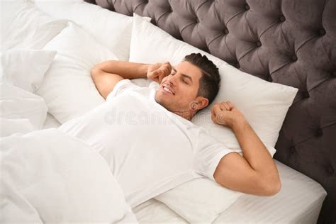 Man Awakening On Bed At Home Lazy Morning Stock Photo Image Of Awake