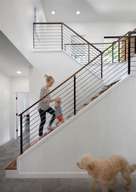 To prep the spindles for installation, sand and paint them to your desired appearance. Stunning Stair Railings (Centsational Girl) | Condo ...