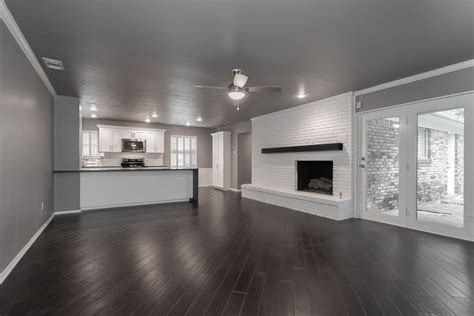 Modern Living Room Dark Wood Floor Floating Fireplace Mantel White