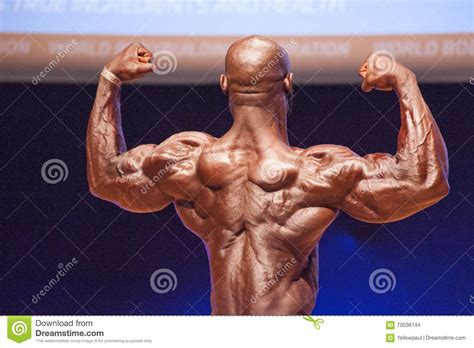 male bodybuilder flexes his muscles and shows his best physique editorial stock image image of