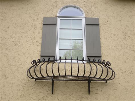 My signature bent iron art railings are handmade from solid 1/2 inch round iron and bent without the use of heat. O'Brien Ornamental Iron