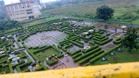 An Aerial View Of A Maze In The Middle Of A Park