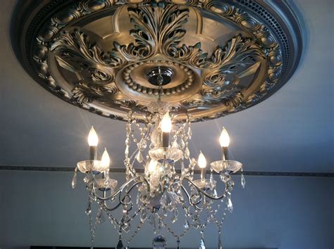 This placement gives even ambient light. Master bedroom chandelier | Chandelier bedroom, Master ...