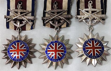 At Auction: Corps of Commissionaires Long Service Medals (3)