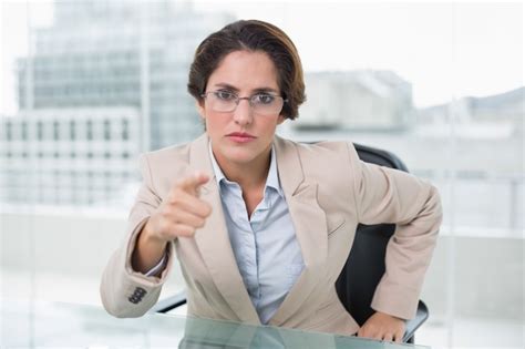 Premium Photo Angry Businesswoman Pointing At Camera