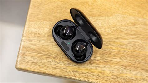 A black galaxy buds plus charging case opens and the pair of earbuds float upwards out of the case. Samsung Galaxy Buds Plus review: Samsung's best buds yet ...