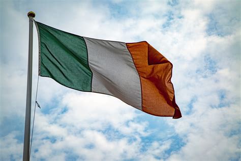 Euro coin and irish flag against white background. Ireland Flag Free Stock Photo - Public Domain Pictures