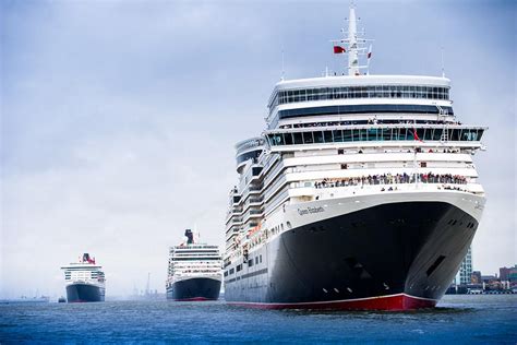 Three Luxury Liners Queen Mary 2 Queen Victoria And Queen Elizabeth Sail Into Hong Kong The