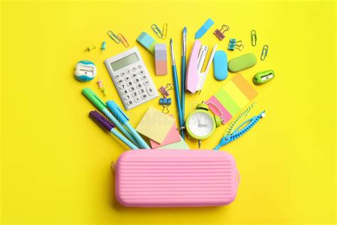 Flat Lay Composition With School Stationery On Yellow Back To School