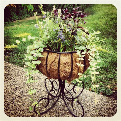Wrought iron railings allow the view to shine through. wrought iron planter (With images) | Iron planters ...