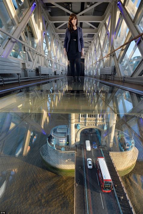 Above the river thames in london. London's Tower Bridge unveils glass walkway with views ...