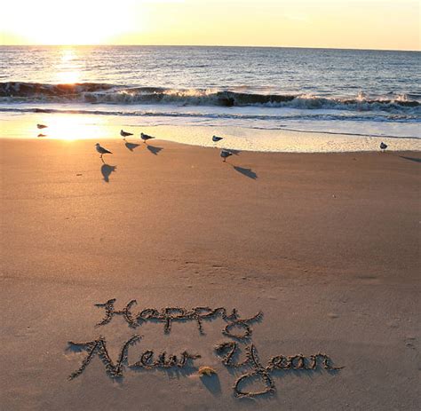 Happy New Year Beach Stock Photos Pictures And Royalty Free Images Istock
