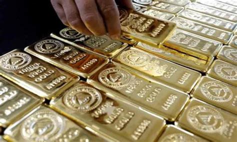 Gold Drops By 215 On Strong Rupee