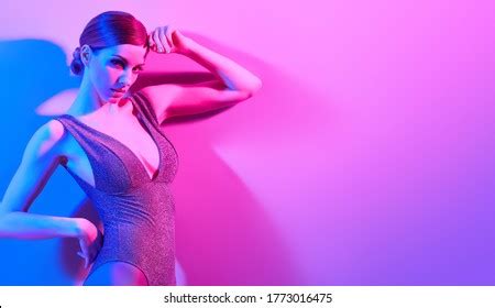 High Fashion Woman Colorful Neon Light Stock Photo