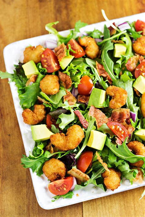 Although you may think of popped corn as being a healthy and harmless treat for yourself, that in no way means the same standard applies to the feline species, especially wee kittens. Popcorn Shrimp Salad Recipe with Avocado and Bacon