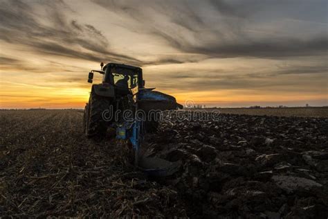 Tractor On The Field During Sunset Stock Photo Image Of Farm Black