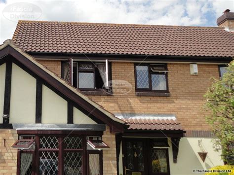 All fascia & soffit rainwater promotions underground drainage building accessories composite decking dry verge external cladding fixings / screws grp internal cladding lead roofing black foiled. Rosewood fascia, White soffit with Black square guttering ...