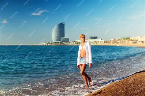 premium photo beautiful sexy shemale woman posing at the beach sea on the background