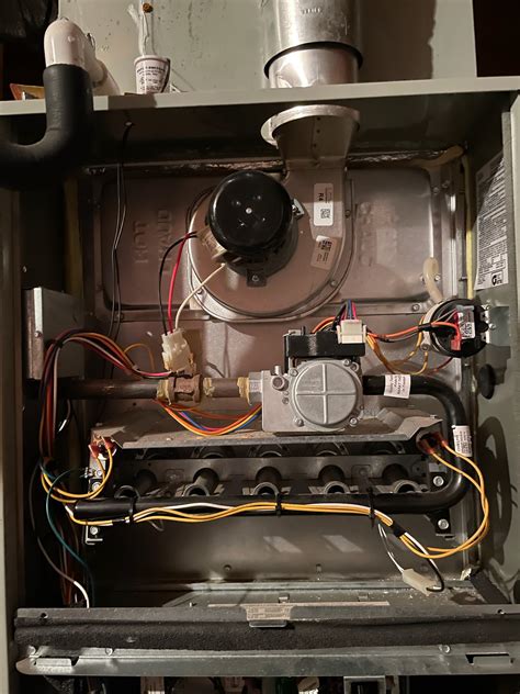 Try;ing to find the reset button on my Trane XV80 furnace. About 5