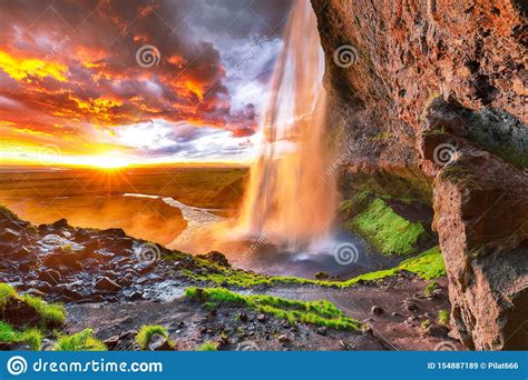 Beautiful Seljalandsfoss Waterfall In Iceland During The Sunset Stock