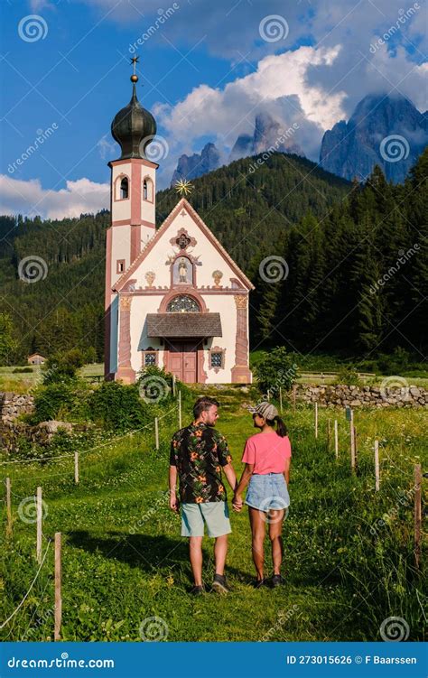 Couple Visit Dolomites Italy Santa Magdalena Village In Dolomites