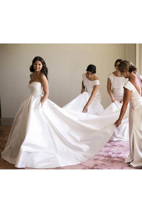 Sometimes the most beautiful gowns are plain and every good bridal boutique should stock simple wedding dresses for those who prefer a more minimalistic approach. Ball Gown Sweetheart Simple Elegant Wedding Dresses Bridal ...