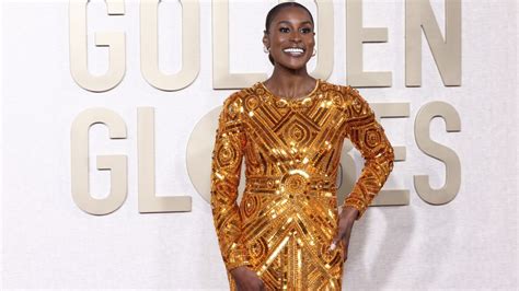 Issa Rae Goes For Gold In Pamella Rolland Gown At Golden Globes 2024