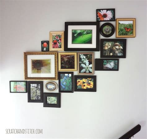 To take your picture off the wall, pull the frame up and off the back of the adhesive strips. Stairway Gallery Wall DIY