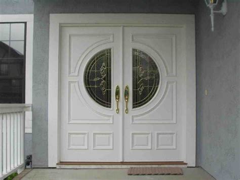 Apartment Entrance Doors White Wooden Frame Painted With White Color