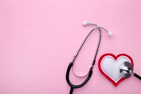 Premium Photo Stethoscope And Heart On Pink