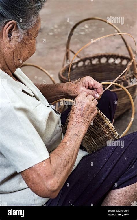 Skillful Hands Of A Local Woman Weaving A Basket Ban Done Keo Laos