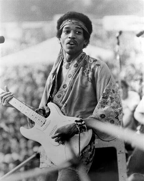 Jimi Hendrix Playing Guitar Smoking