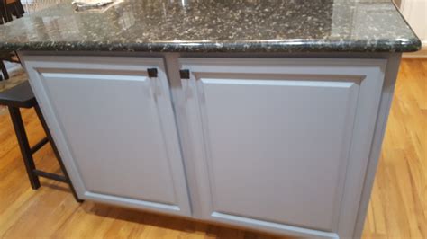 Need help picking a matching color for divine white sw 6105? Divine White + Steely Gray Kitchen Cabinets - 2 Cabinet Girls