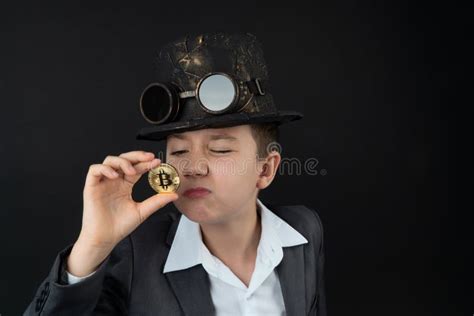 One Bitcoin In The Hand Of Young Boy Concept Stock Photo Image Of