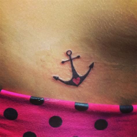 Awesome Cross Anchor With Tiny Heart Tattoo Design