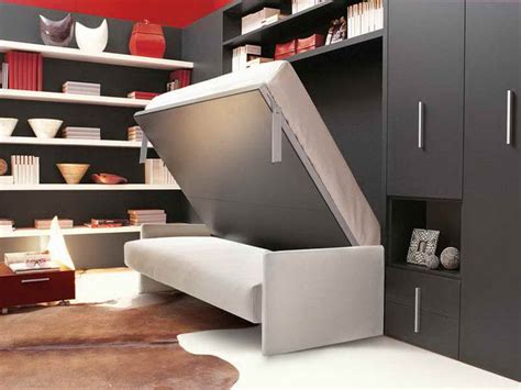 The Stylish Italian Wall Mounted Folding Bed With Skin Rug ... This is what you need if you have a small space in your this pull down bed is the ultimate way to save space and make an area multi functional.