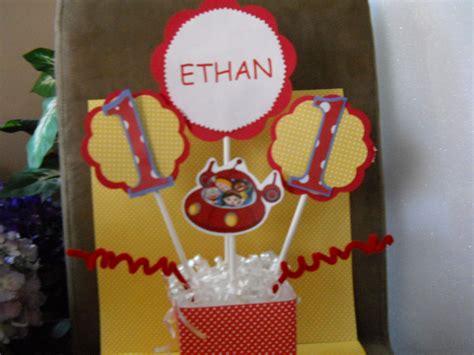 Little Einstein Party Centerpieces Are Personalized With Your Childs