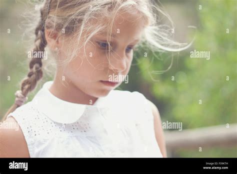 Portrait Of A Girl Looking Pensive Stock Photo Alamy