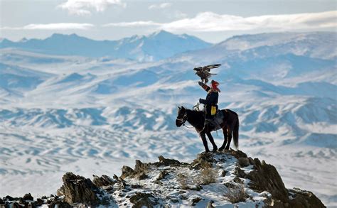 A Rider Hunts With An Eagle In The Altai Mountains Of Mongolia Altai