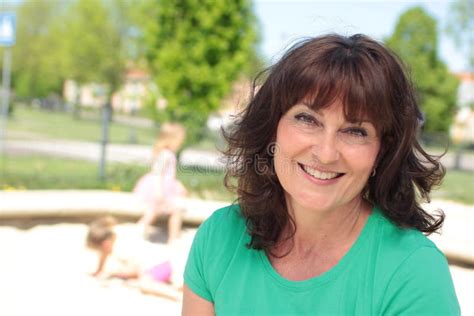 beautiful happy mature caucasian woman outside in the park stock image image of health