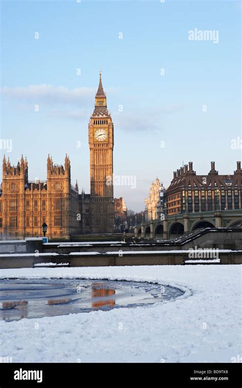 Snow On Ground In Front Of Houses Of Parliament And Big Ben London