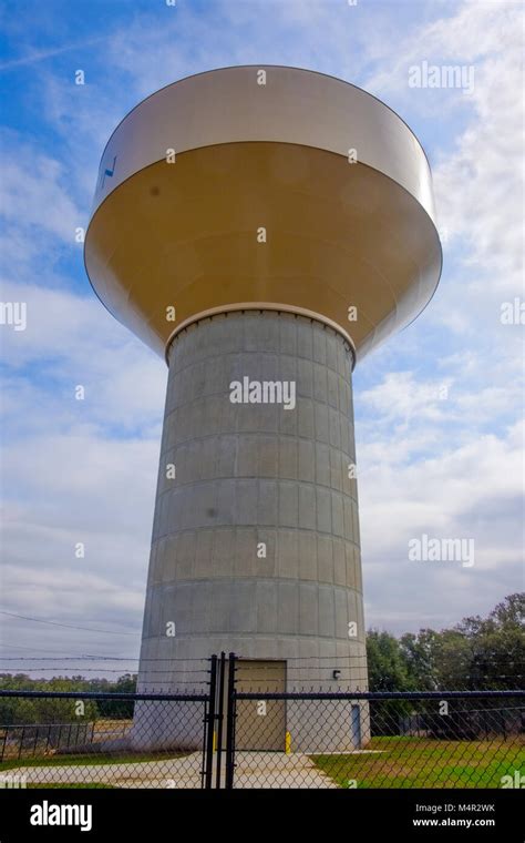 Large Water Tower Used For Municipal Water Storage And Supply Shown