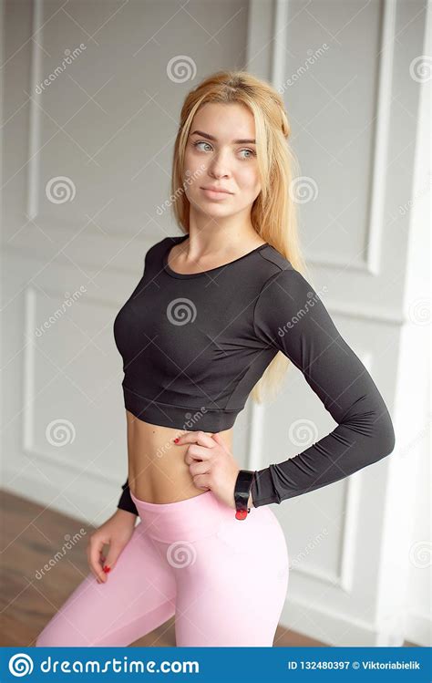 Young Slim Woman With An Athletic Body Long Blonde Hair Wearing In